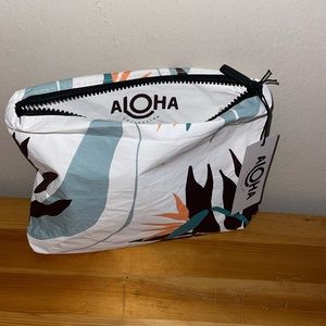 Brand new! Aloha Splash-Proof travel pouch.